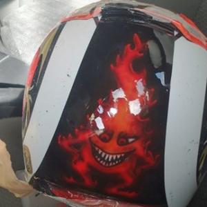 finisjhed fire elemental on back of helmet